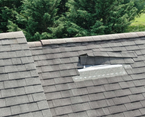 Aerial Drone Close Up of Roof Damage, Missing Shingles