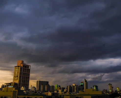 View of storm clouds over a large city